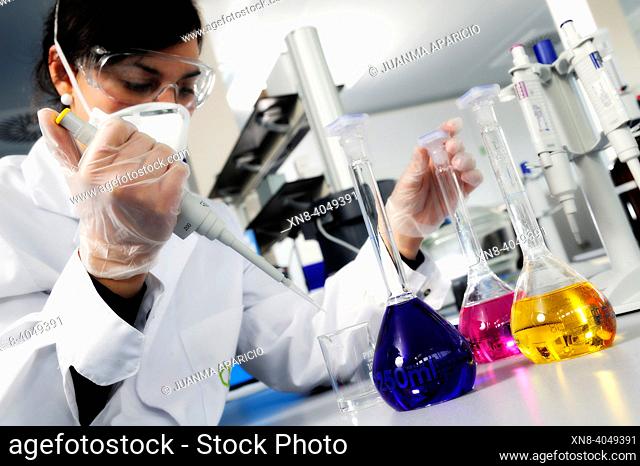 Laboratory technician working with test tubes