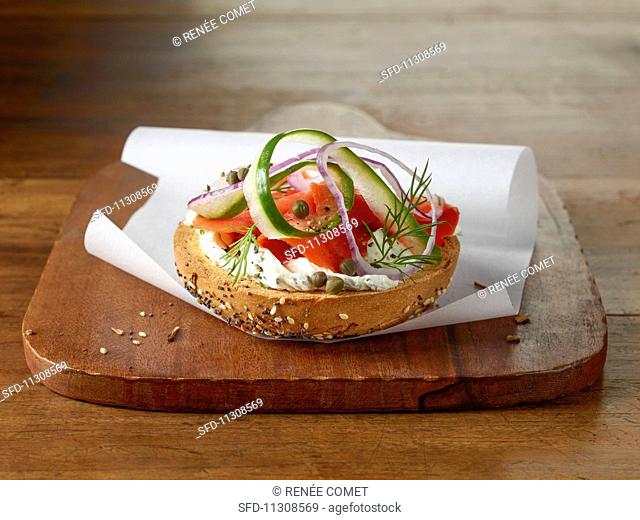 Bagel with cream cheese, wild salmon, capers and cucumber
