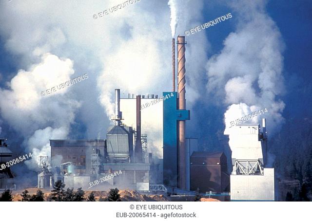Papermill emitting smoke and steam