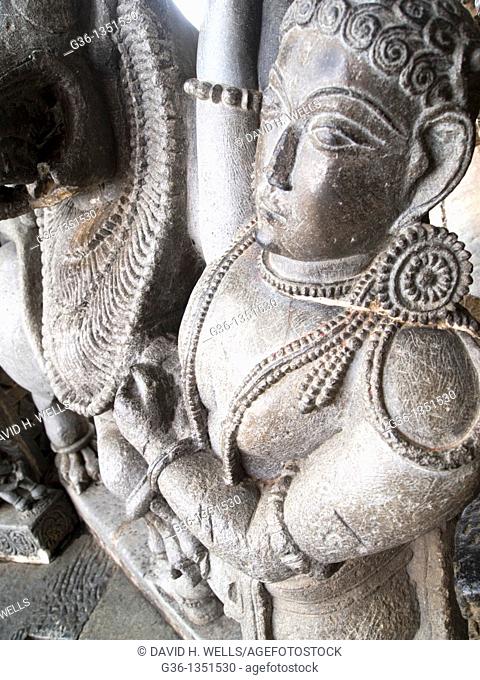 Carvings in temple walls in 'Hoysaleshwara' Hindu temple in Halebid, Karnataka, India