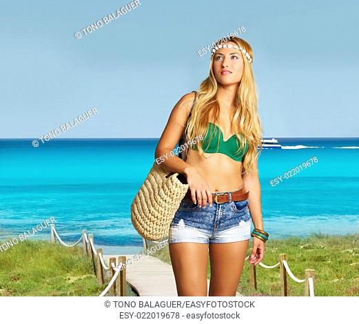 Blond sexy tourist girl in tropical beach of Formentera photomount