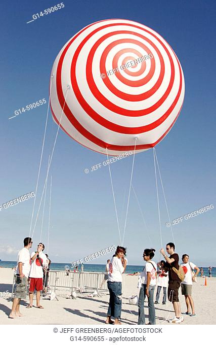 ArtCenter South Florida benefit, volunteers. Skywalkers Giant Blimp Parade. Atlantic Shore. Miami Beach. Florida. USA