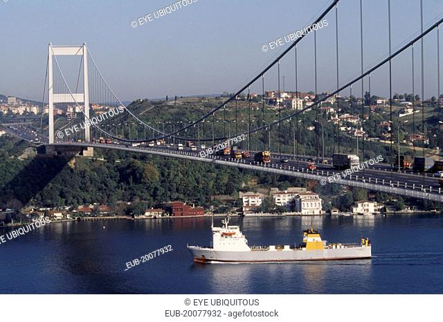 Faith Bridge from the European side with ship passing below. Bosphorus Bridge