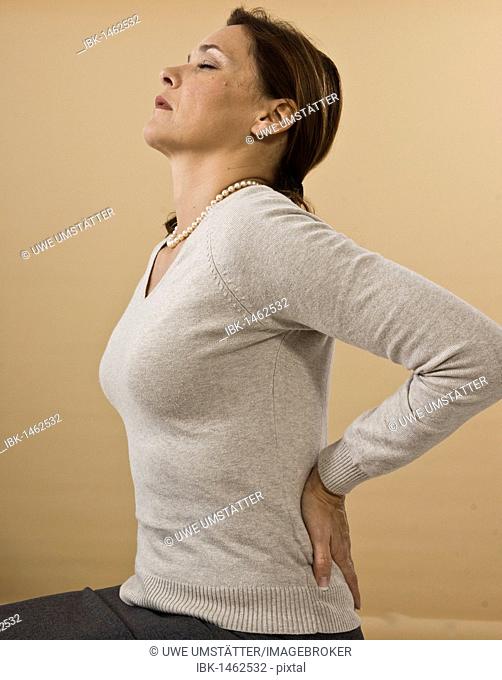 Woman with backache