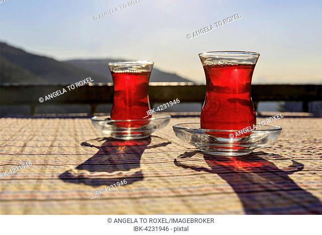 Turkish tea in two glasses on a table, Istanbul Province, Turkey