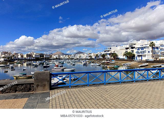 Spain, Canary islands, Lanzarote, Arrecife, harbor, fisher boats, clouds, sky
