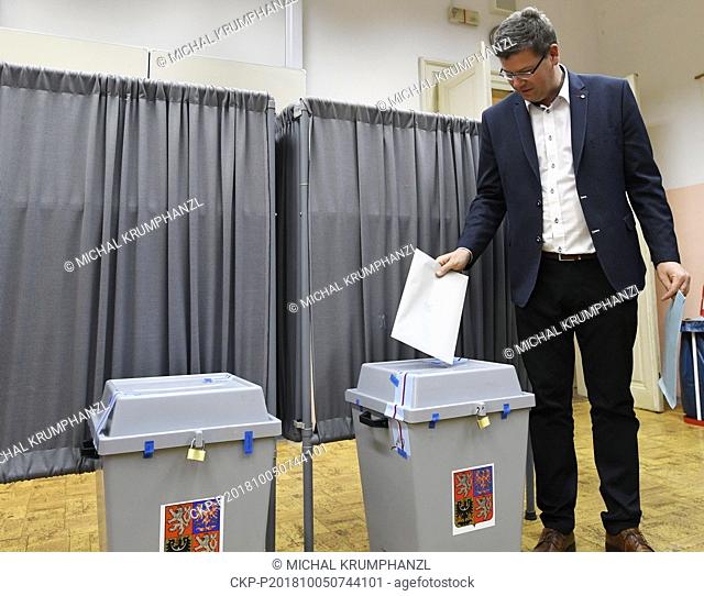 Jiri Pospisil, Chairman of the TOP 09 political party casts their ballot at a polling station during the First day of local elections in Prague, Czech Republic