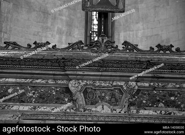 san michele, lucca, italy. the altar with a 12c crucifix and the corpse of san davino, an 11c armenian pilgrim who is said to have miraculous powers