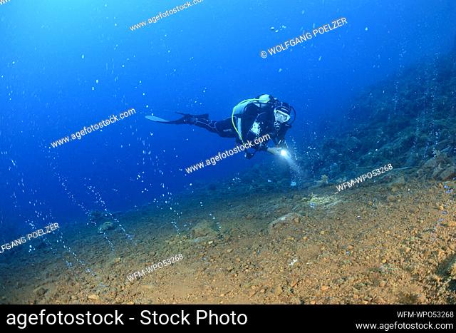 Scuba Diver and volcanic gas bubbles, Alor Archipelago, Indonesia