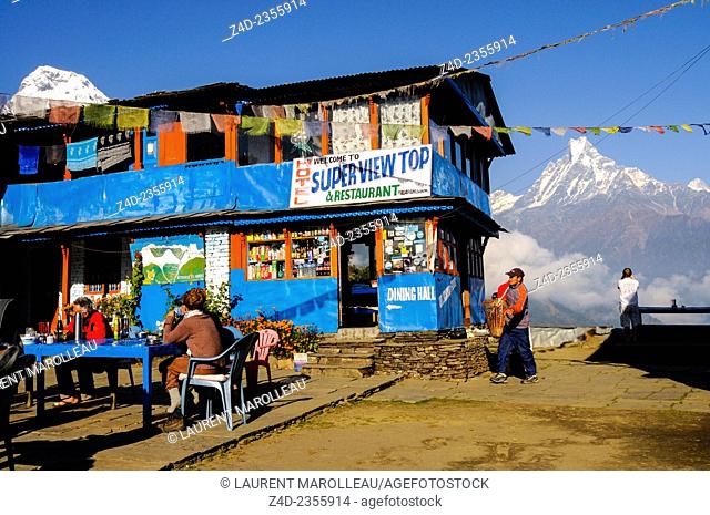 Hotel Restaurant and Machapuchare Peak or the Fish Tail Mountain (6993m). Tadapani Village, Kaski District, Gandaki Zone, Annapurna Conservation Area