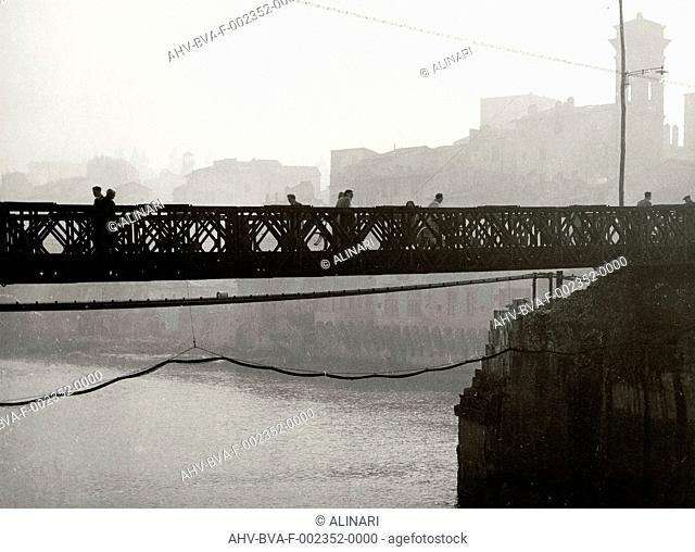 Walkway iron on the ruins of the Ponte Santa Trinita in Florence destroyed by the explosion of mines of the Second World War, shot 1944 by Balocchi Vincenzo
