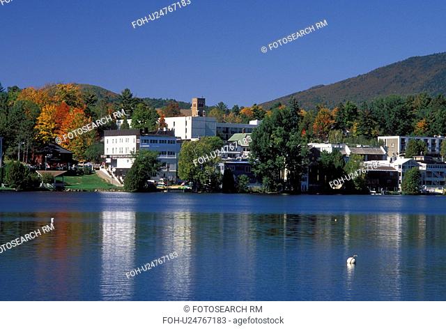 NY, Lake Placid, The Adirondacks, New York, Scenic view of the resort town of Lake Placid along Mirror Lake in the autumn