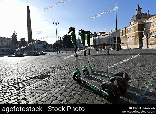 Electric scooters at the Piazza del Popolo. To respect the urban decor, sharing elecrtic scooters will not be allowed to 'park wild' in the squares of the city...
