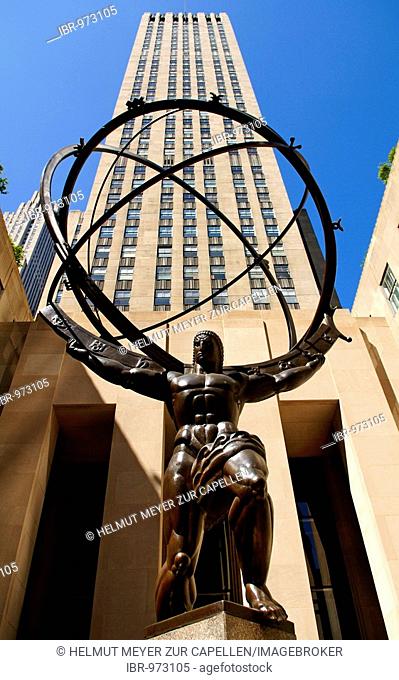 Atlas Statue at the Rockefeller Center, in the back an office building, New York City, USA