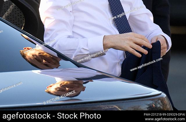18 December 2023, Saxony, Riesa: Michael Kretschmer (CDU), Minister President of Saxony, gets out of an official car before the start of the inauguration of a...