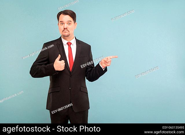. Indoor, studio shot, isolated on light blue or gray background