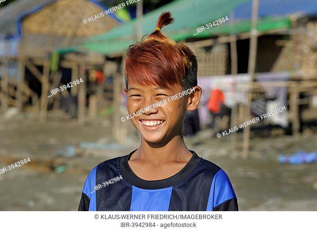 Boy from the slums with dyed hair and fashionable hairstyle, Irrawaddy, Mandalay, Mandalay District, Myanmar