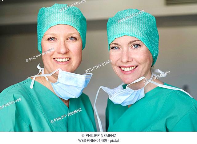 Portrait of two smiling women in scrubs