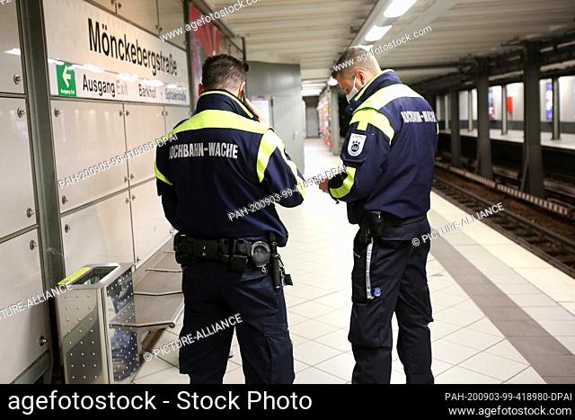 03 September 2020, Hamburg: Employees of the Hamburger Hochbahn guard found a violation of the obligation to wear masks at the Mönckebergstraße subway station...