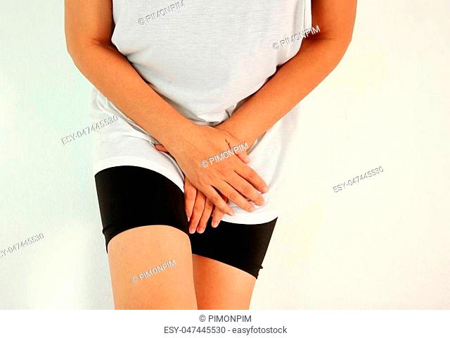 Young pretty girl needs a toilet Stock Photos and Images | agefotostock