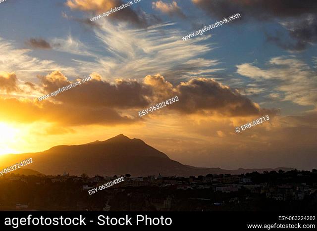 Magic sunset over Procida Island with Ischia island in the background