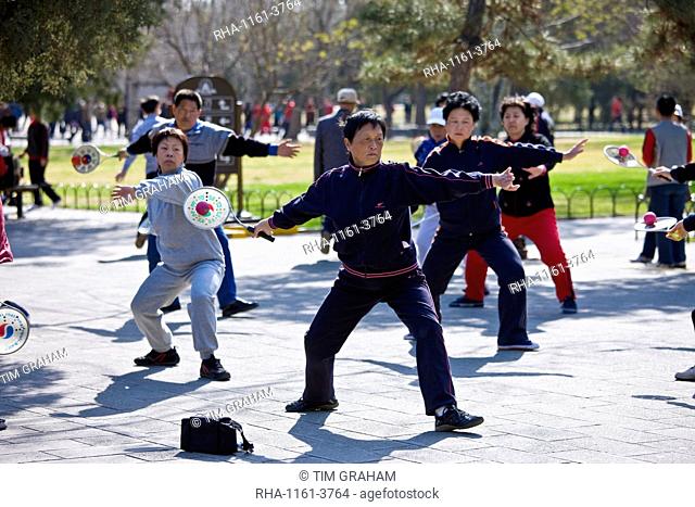 Tai chi with bat and ball in park of the Temple of Heaven, Beijing, China