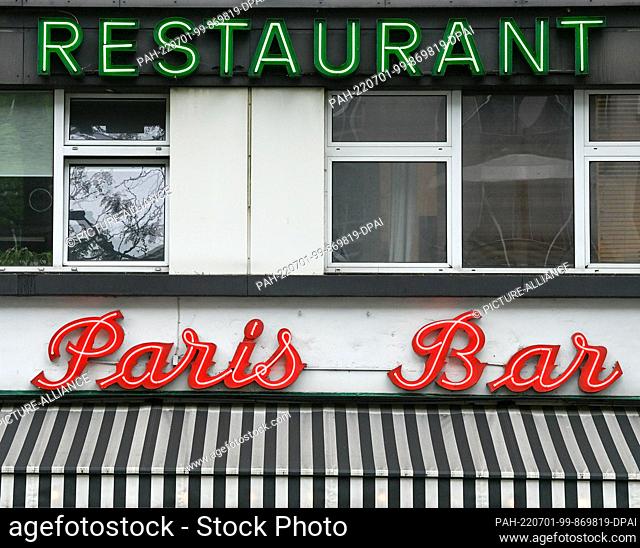 PRODUCTION - 20 June 2022, Berlin: The lettering ""Restaurant Paris Bar"" on Kantstraße. Once you start paying attention