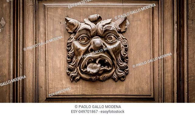 Italy, Turin. This city is famous to be a corner of two global magician triangles. This is a protective mask of stone on the top of a luxury palace entrance