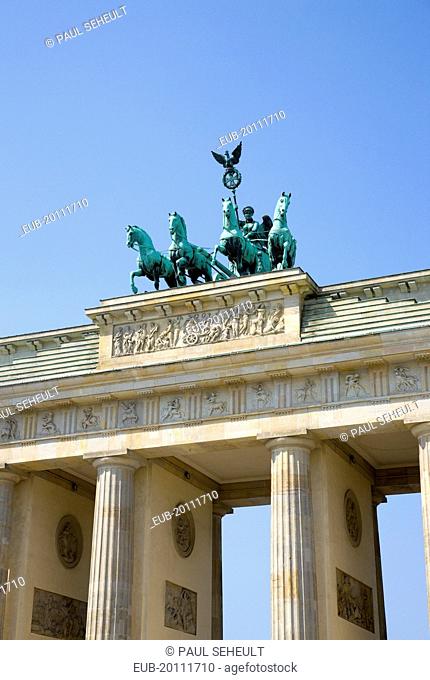 Mitte Brandenburg Gate or Bransenburger Tor in Pariser Platz leading to Unter den Linden and the Royal Palaces with the Quadriga of Victory on top