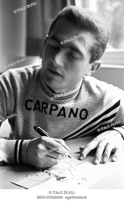 Italian cyclist Italo Zilioli autographing a postcard with a picture of himself. 1960s