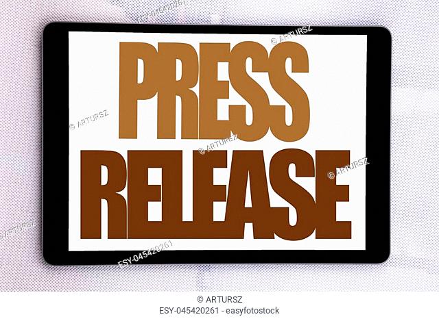 Hand writing text caption inspiration showing Press Release. Business concept for Statement Announcement Message written on tablet screen on white background
