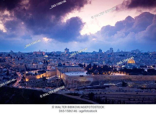 Israel, Jerusalem, elevated city view with Temple Mount and Dome of the Rock from the Mount of Olives, dusk