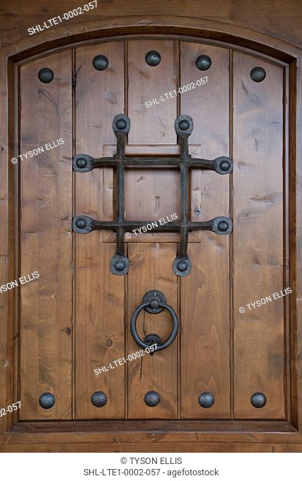 Wooden door with speakeasy