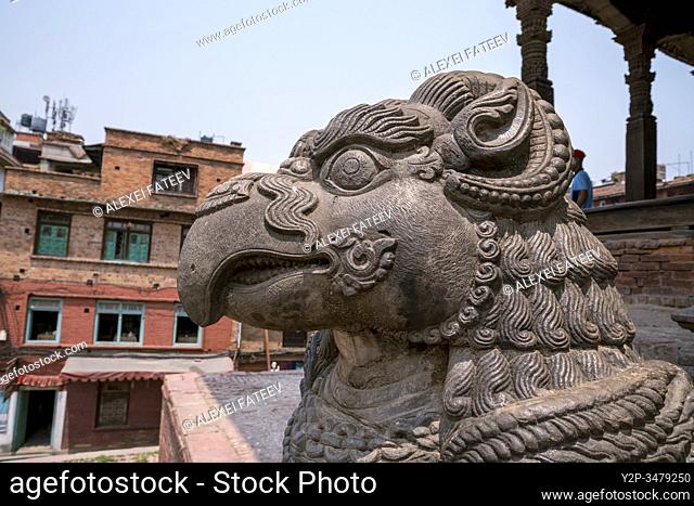 Sculpture of beaked griffons with rams horns - a guardian of Nyatapola Temple in Bhaktapur, Kathmandu valley, Nepal