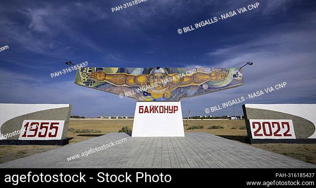 A mosaic sign welcomes visitors outside the town of Baikonur, Kazakhstan, Saturday, Sept. 17, 2022. NASA team members arrived in Baikonur