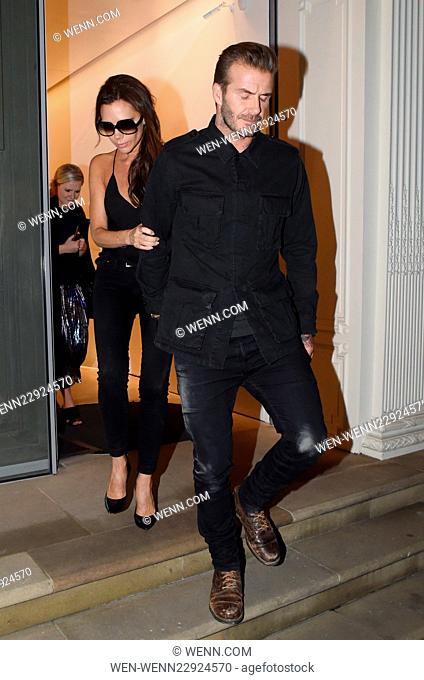 David and Victoria Beckham pictured leaving her flagship London store at 2am hand in hand after rumours surfaced that there relationship was under strain