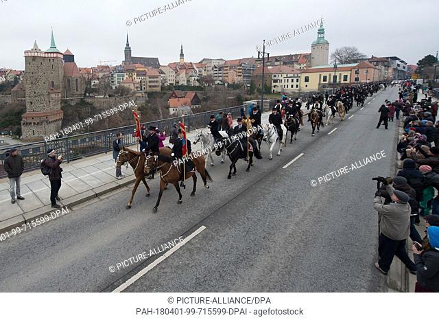 01 April 2018, Germany, Bautzen: Traditionally attired Sorbian Easter riders spreading the Easter news in the old fasion in the Sankt Marienstern monastery