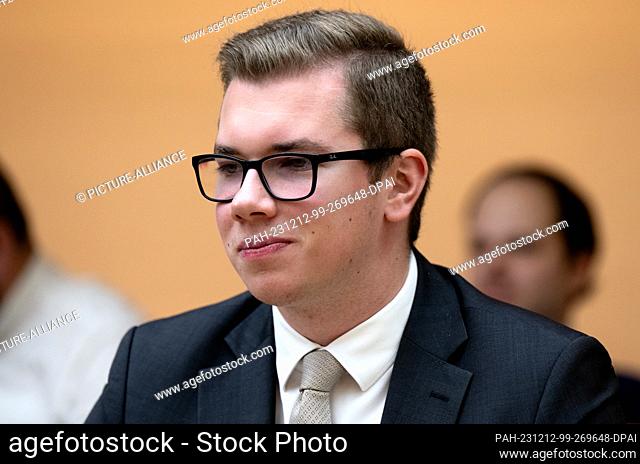 12 December 2023, Bavaria, Munich: Daniel Halemba, AfD politician, takes part in a plenary session in the Bavarian state parliament