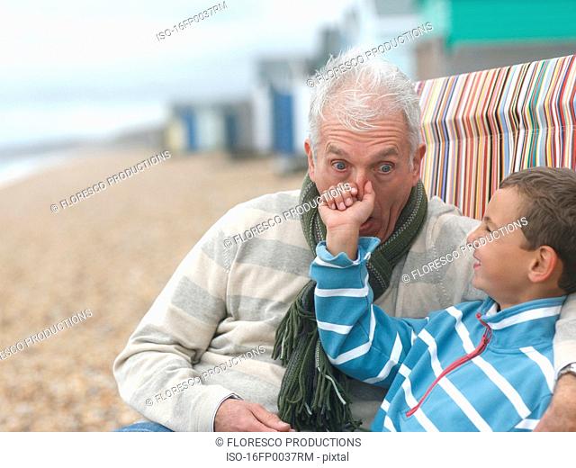 Grandfather and Grandson at Beach