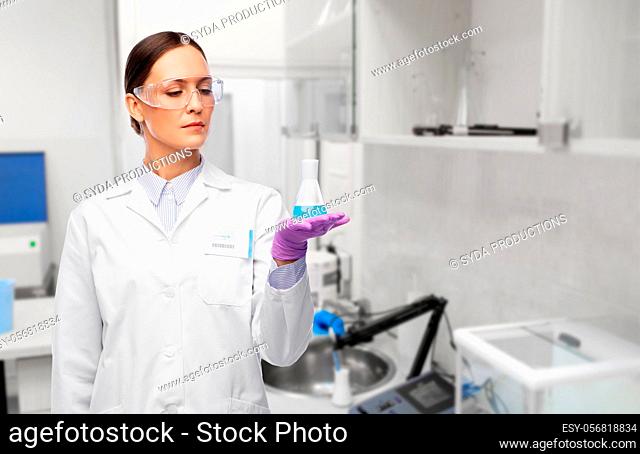 female scientist with chemical at laboratory