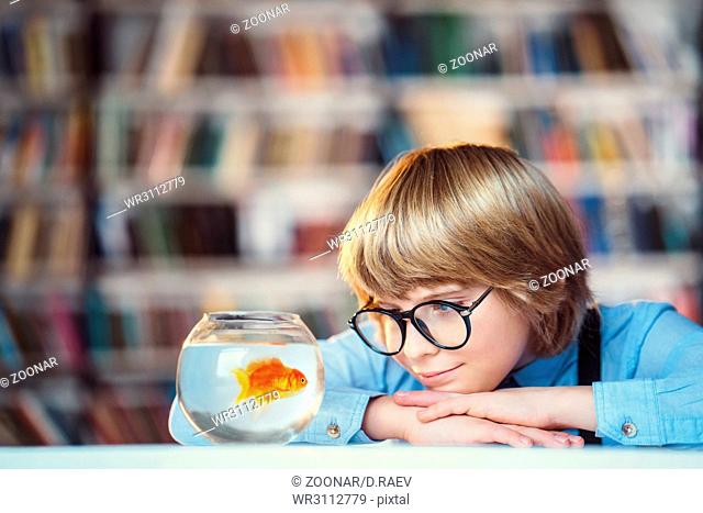 Little boy with aquarium