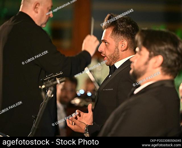 From left Christo Pavlov, conductor of Moravian Philharmonic Orchestra Olomouc and tenors Federico Parisi, Giovanni Maria Palmia perform during the opening gala...