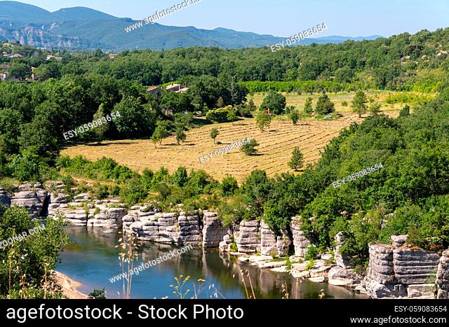 Panorama Landscape by the river Ardeche, framed by trees and gorges at