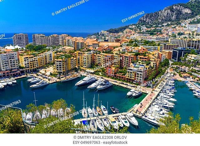 Yachts in bay near houses and hotels, Fontvielle, Monte-Carlo, Monaco, Cote d'Azur, French Riviera