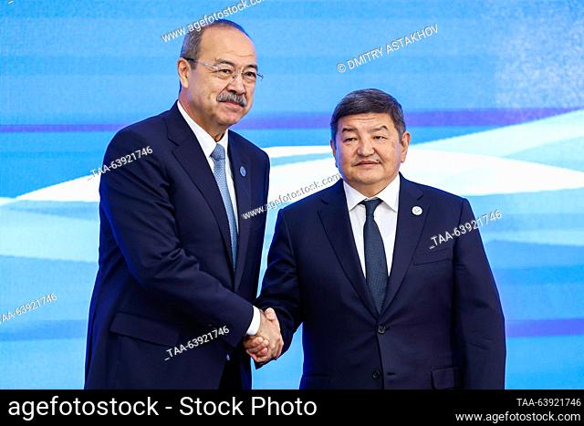 KYRGYZSTAN, BISHKEK - OCTOBER 26, 2023: Uzbekistan's Prime Minister Abdulla Aripov (L) and Kyrgyzstan's Cabinet of Ministers Chairman/ Head of the Presidential...