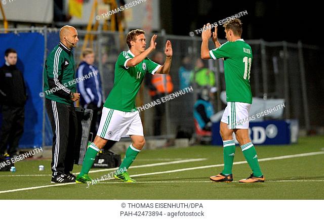 Germany's Miroslav Klose (R) and Max Kruse are pictured during the FIFA World Cup 2014 qualification group C soccer match between the Faroe Islands and Germany...