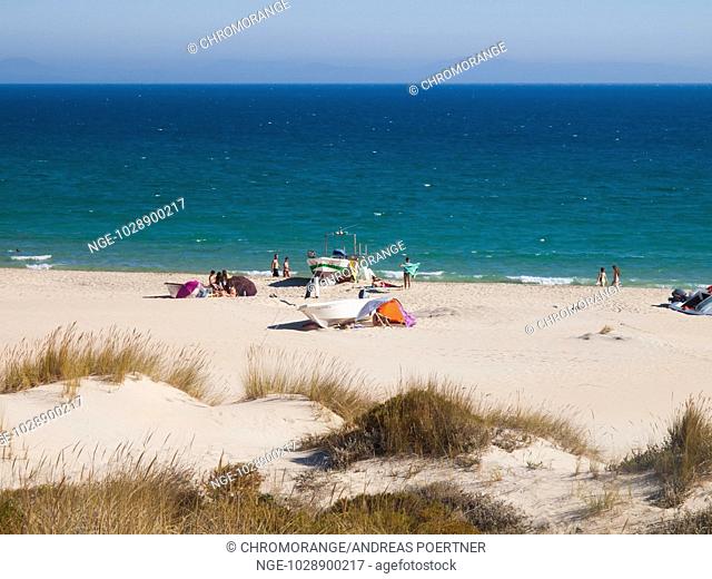 Beach of Bolonia, Costa de la Luz, with people sunbathing and enjoying their holidays