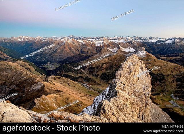 Alpine mountain landscape with snow-capped mountains after sunset. View from Widderstein to Warth and Hochtannbergpass. Tyrol, Vorarlberg, Austria, Europe