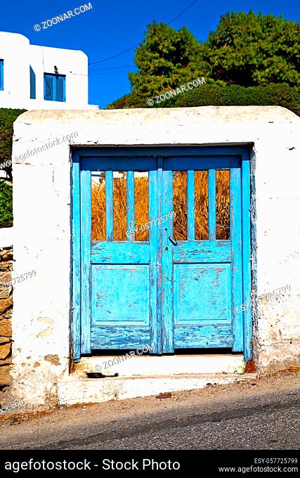 blue door   in antique village santorini greece europe  and white wall