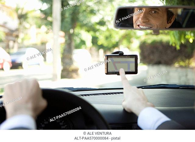 Driver using GPS for navigation assistance